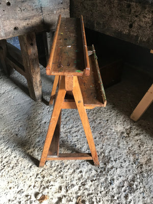 A wooden floor standing school easel