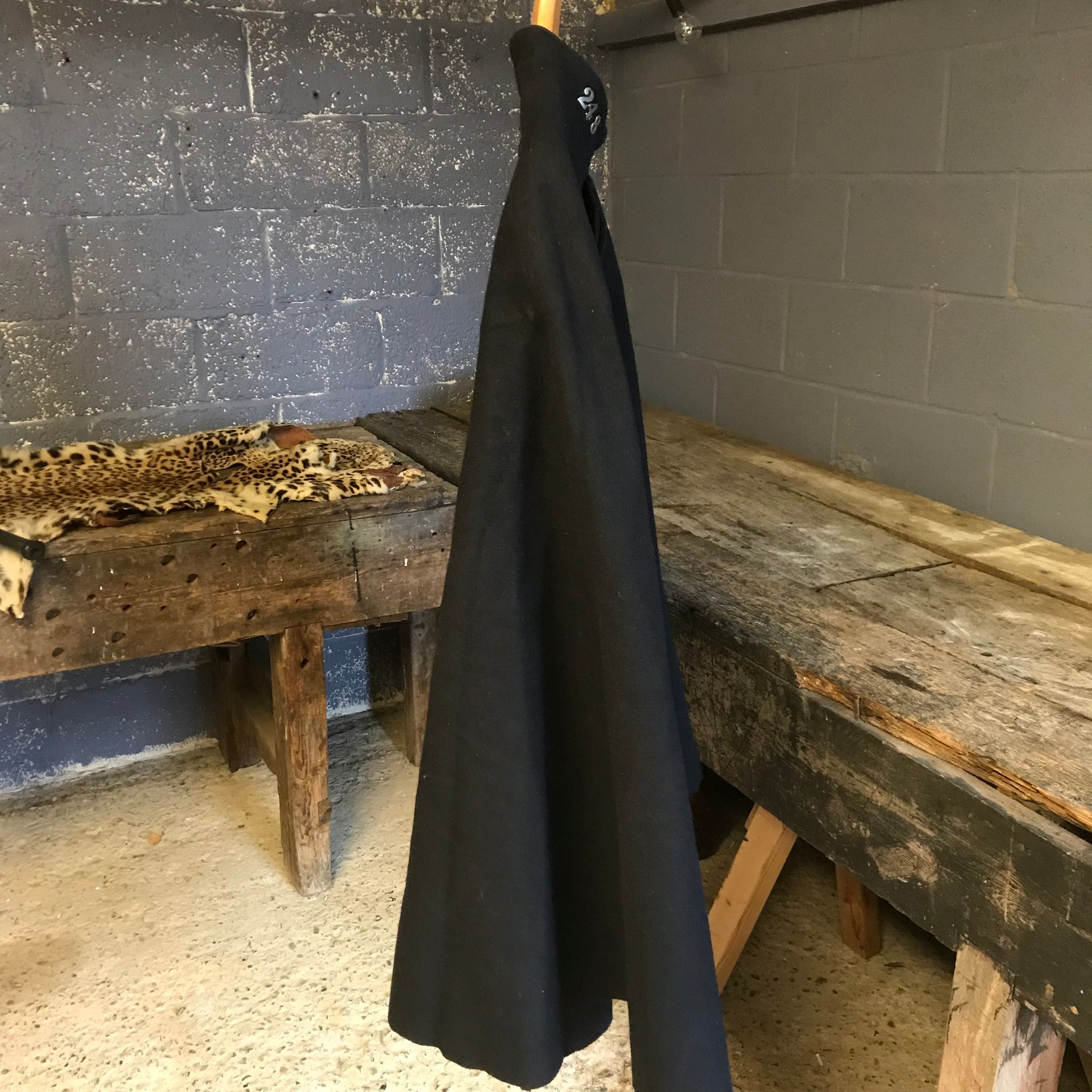 An early woolen police cape with black lion head clasp- Hertfordshire Constabulary