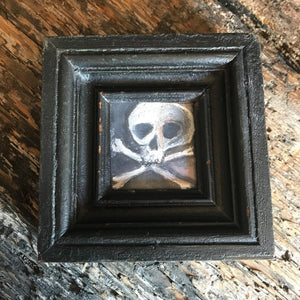 A miniature Memento Mori naive skull vanitas oil painting