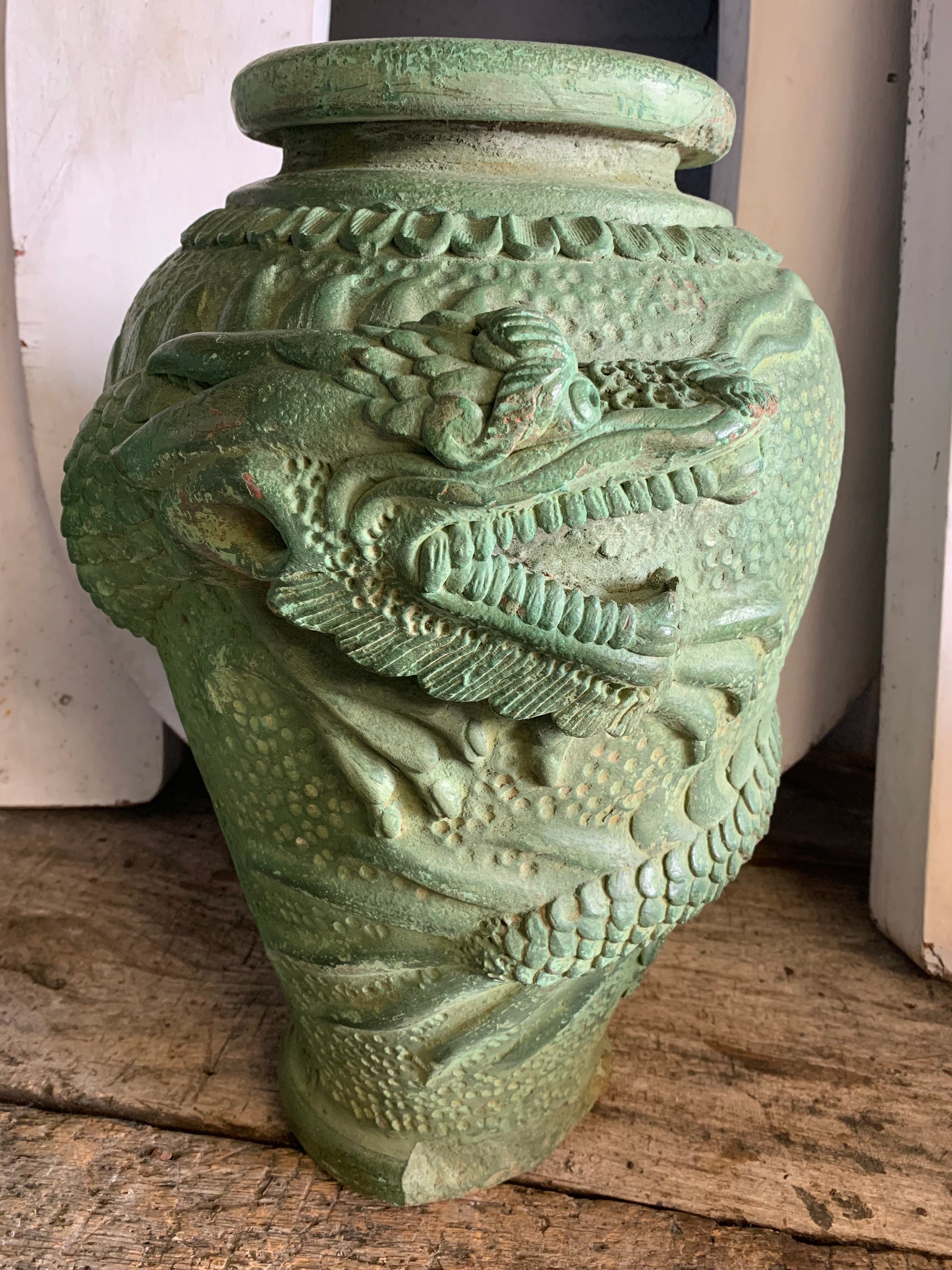 A large pair of green Yixing / Tokoname style terracotta dragon motif urns