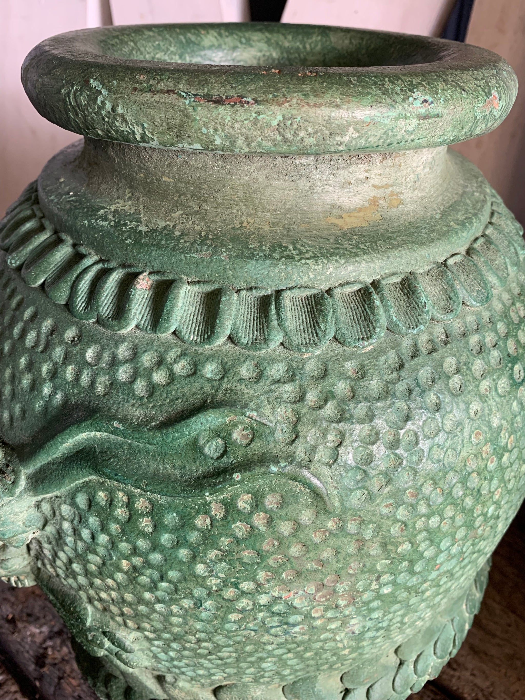 A large pair of green Yixing / Tokoname style terracotta dragon motif urns