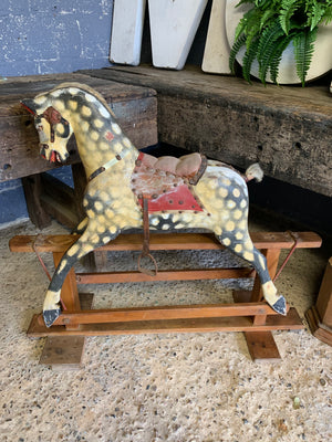 An Edwardian Collinson rocking horse in original condition