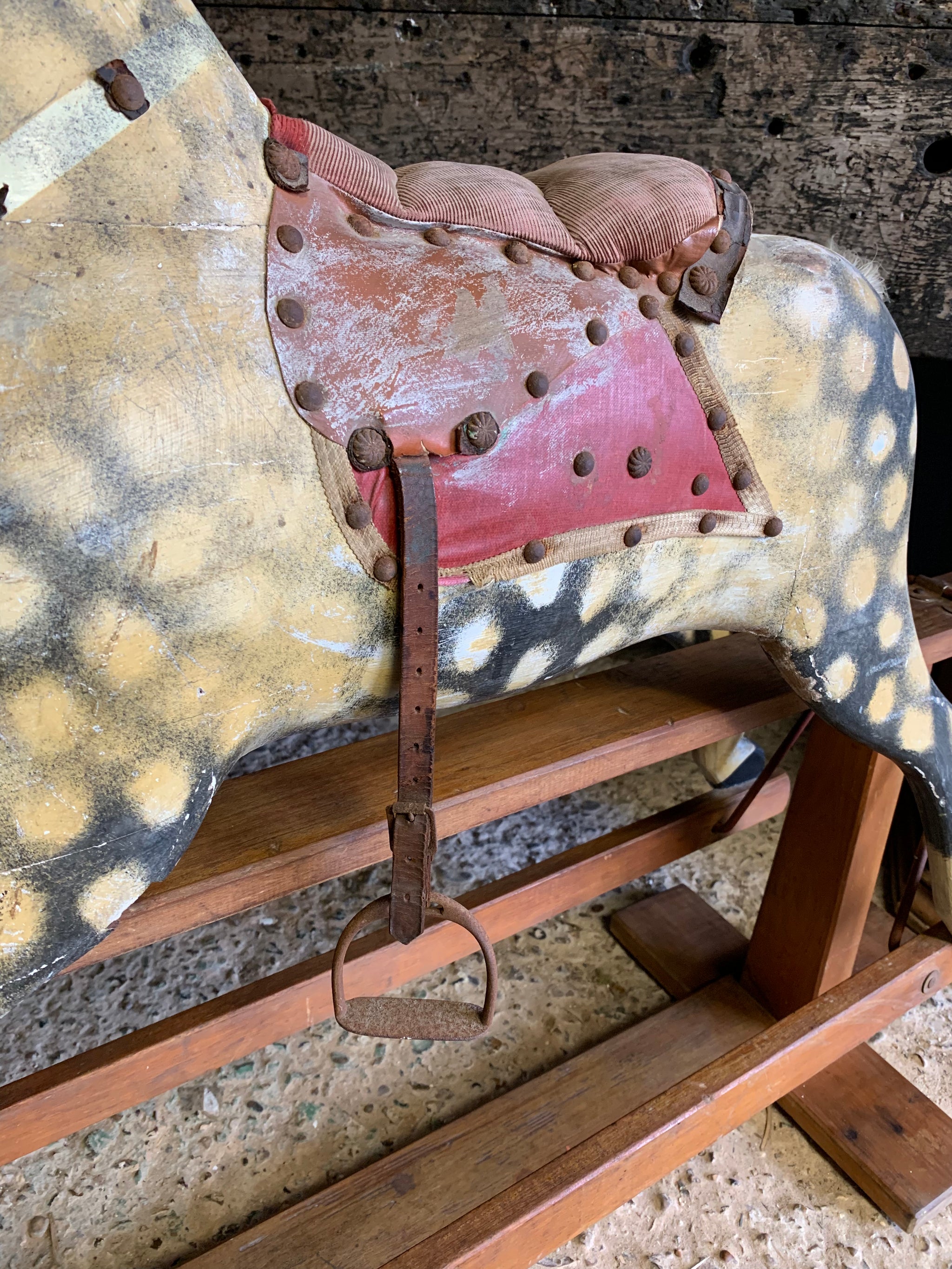 An Edwardian Collinson rocking horse in original condition