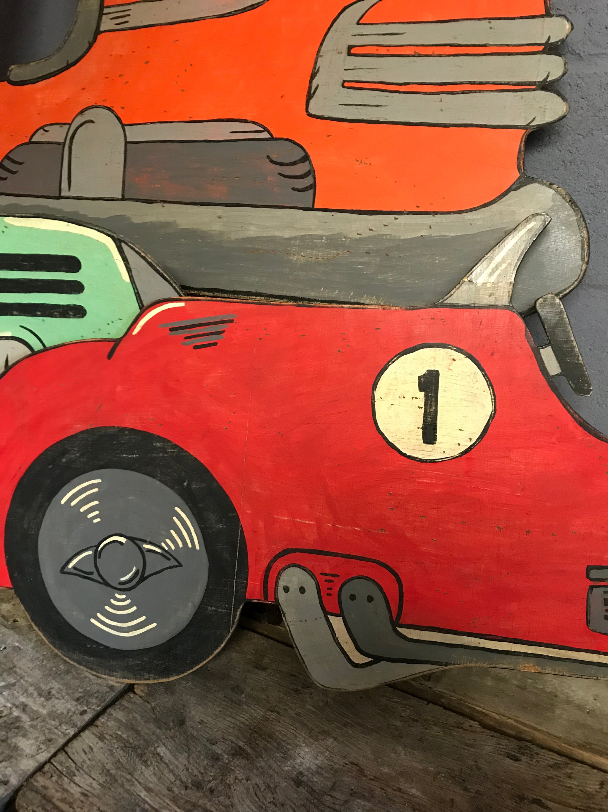 A hand painted speedway vintage racing car cut out panel- red