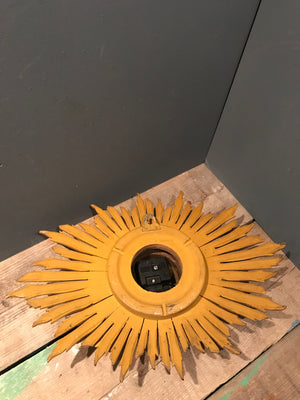 A giltwood sunburst convex wall clock