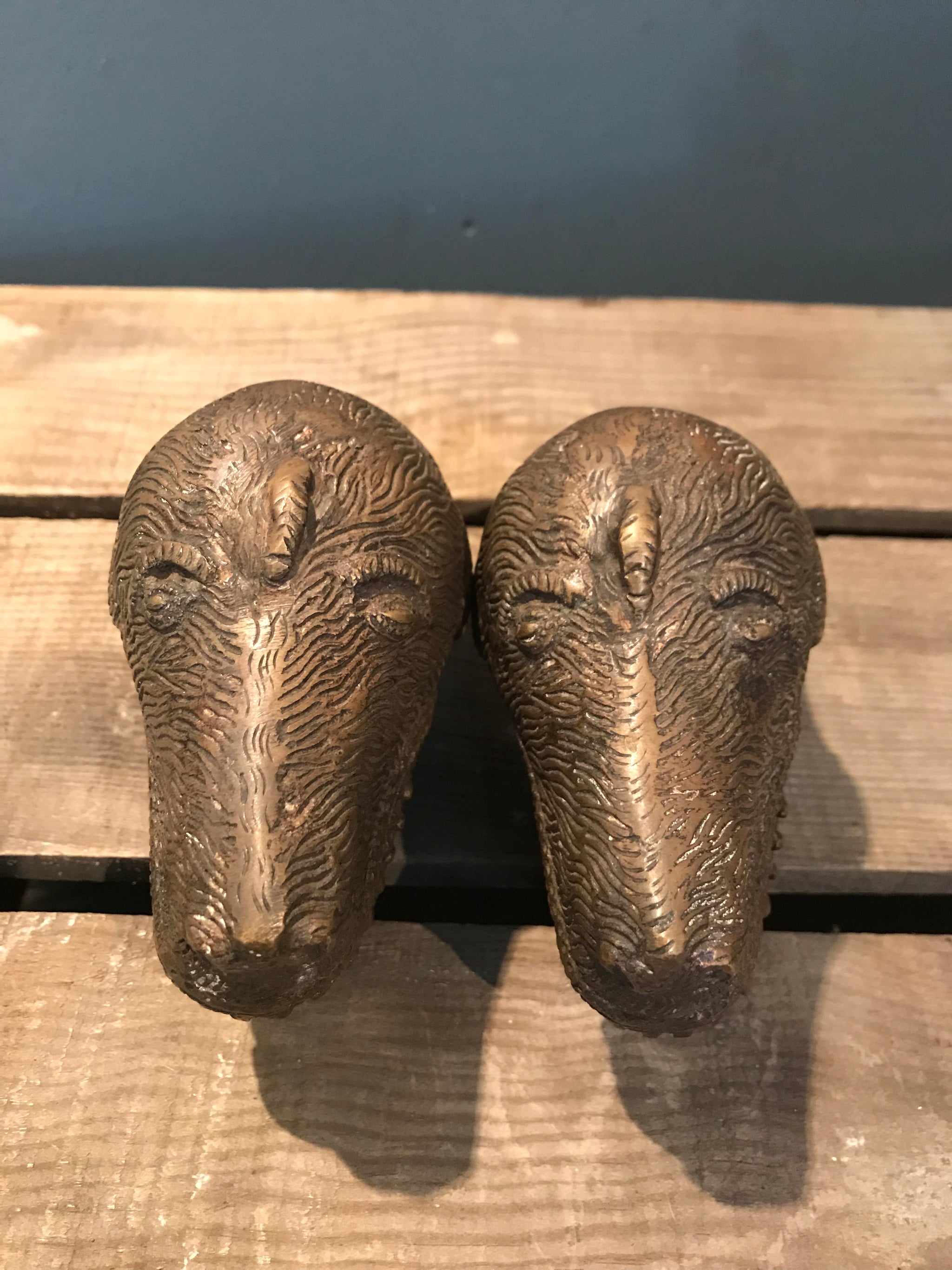 A pair of dog head bronze palanquin finials