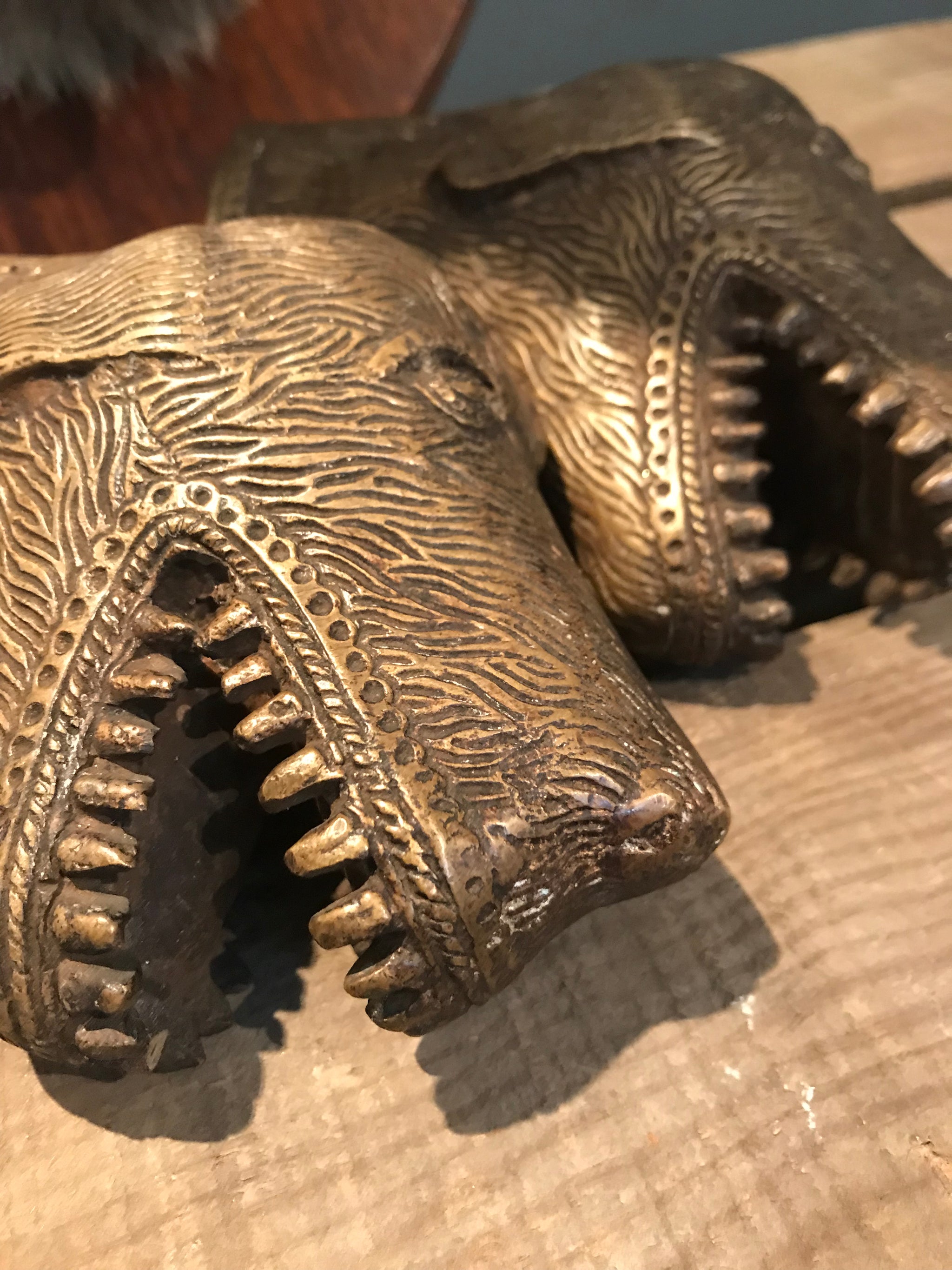 A pair of dog head bronze palanquin finials