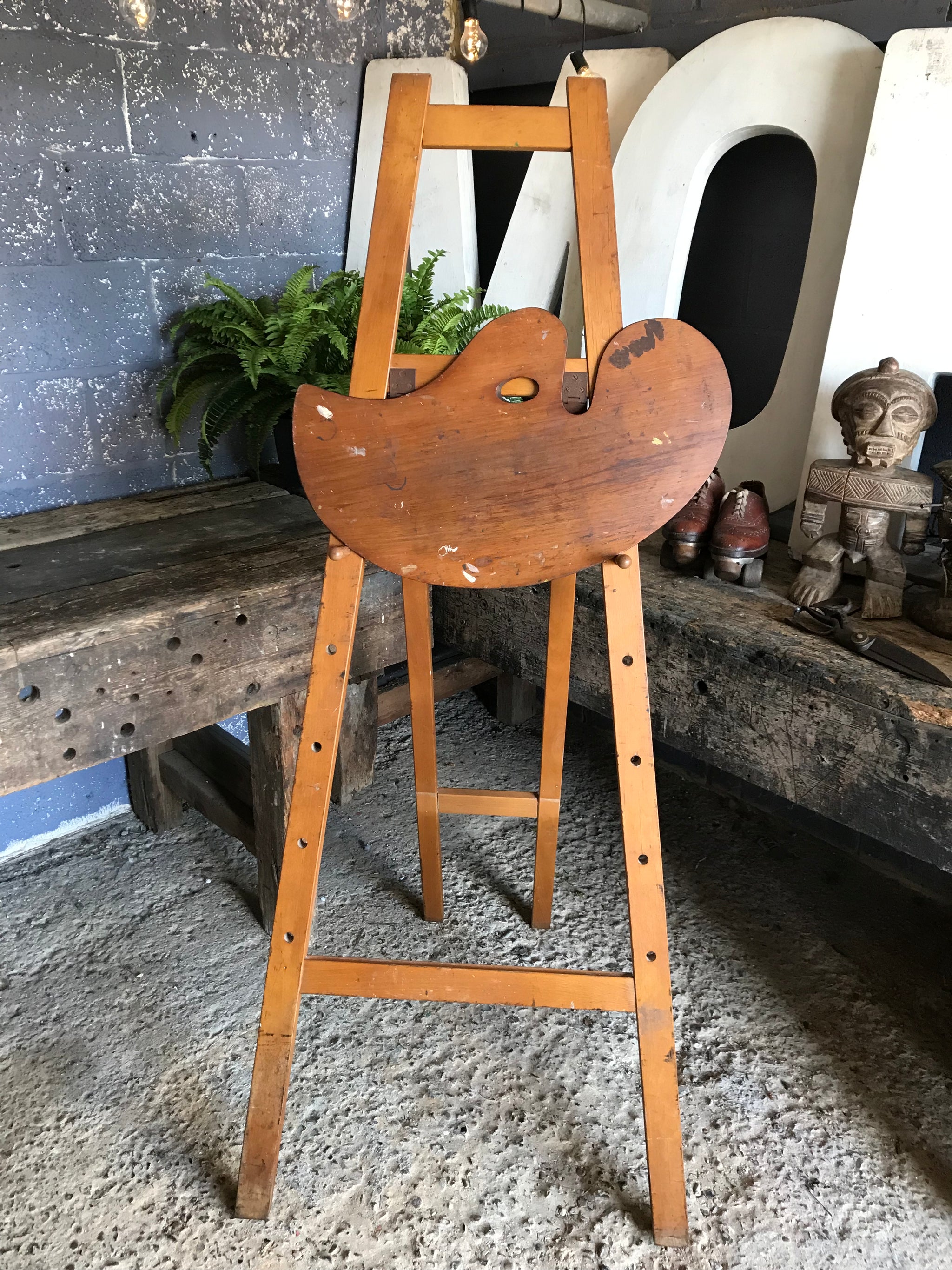 A flat full size floor standing studio peg easel