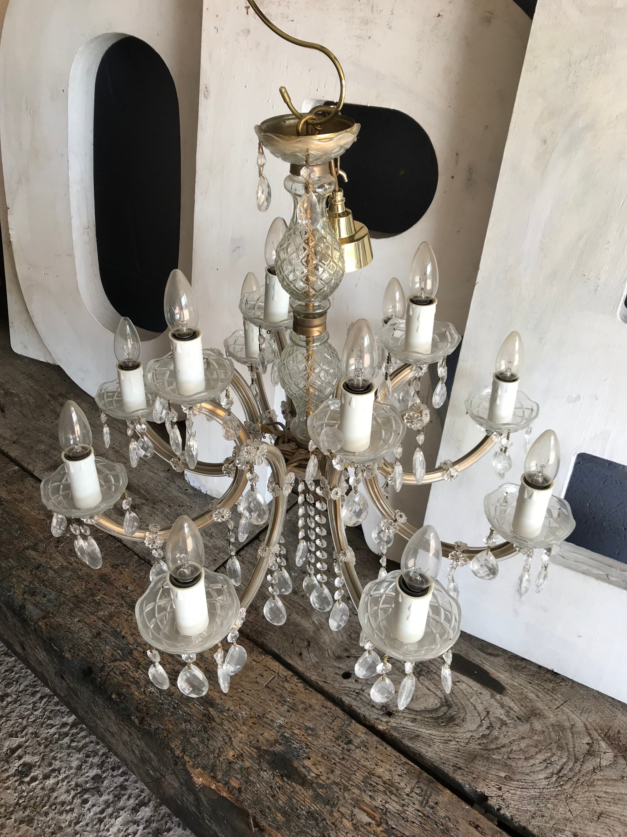 A large cut glass twelve light chandelier