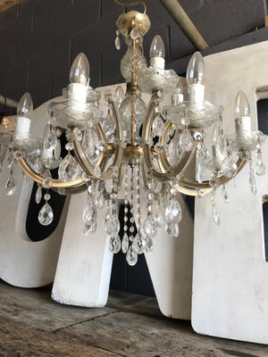A large cut glass twelve light chandelier
