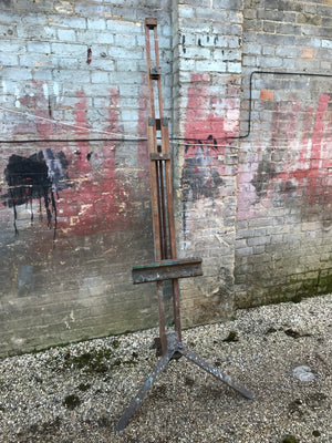 An oak floor standing studio artists easel