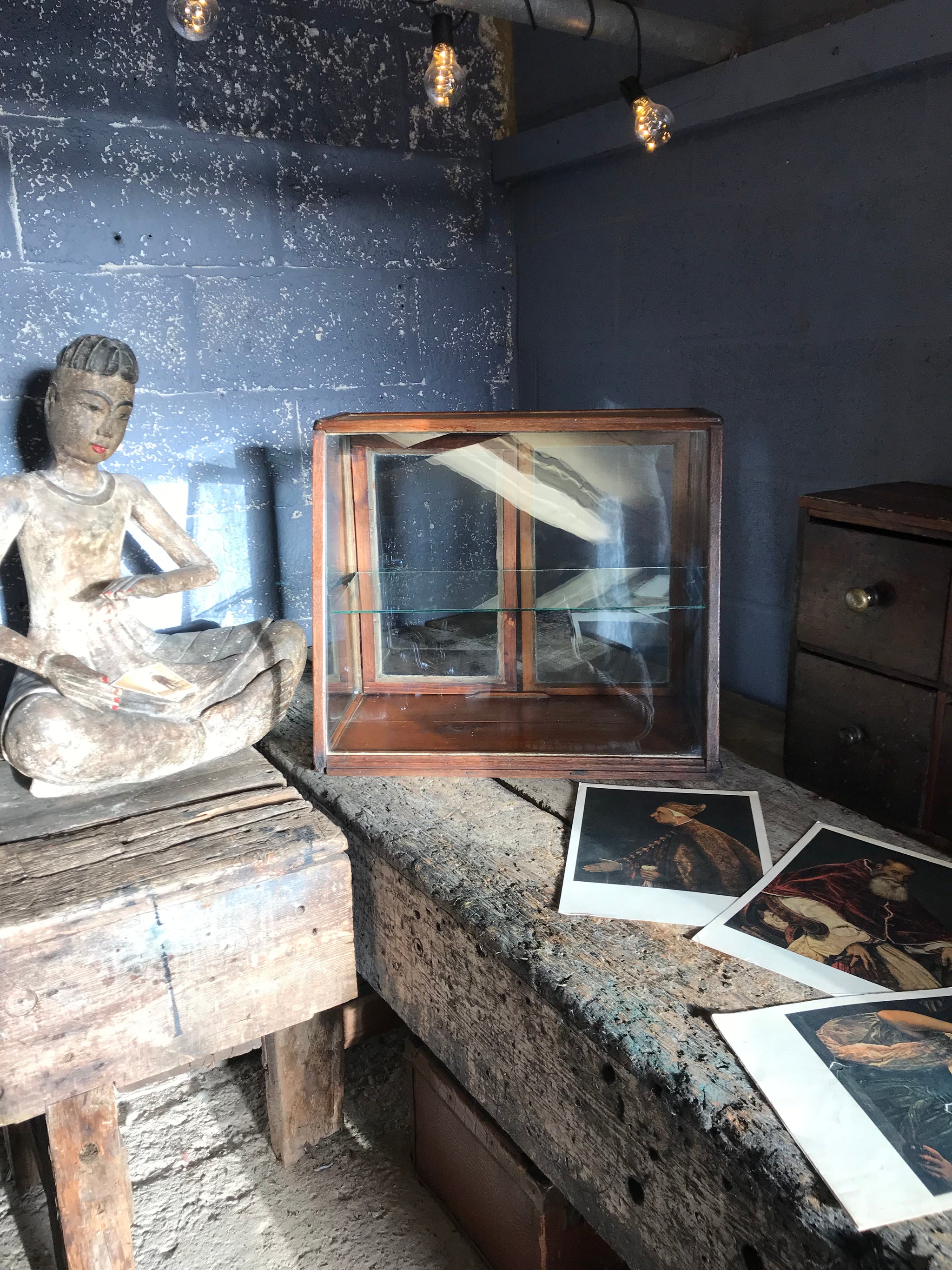 A sloping counter top glass shop display cabinet