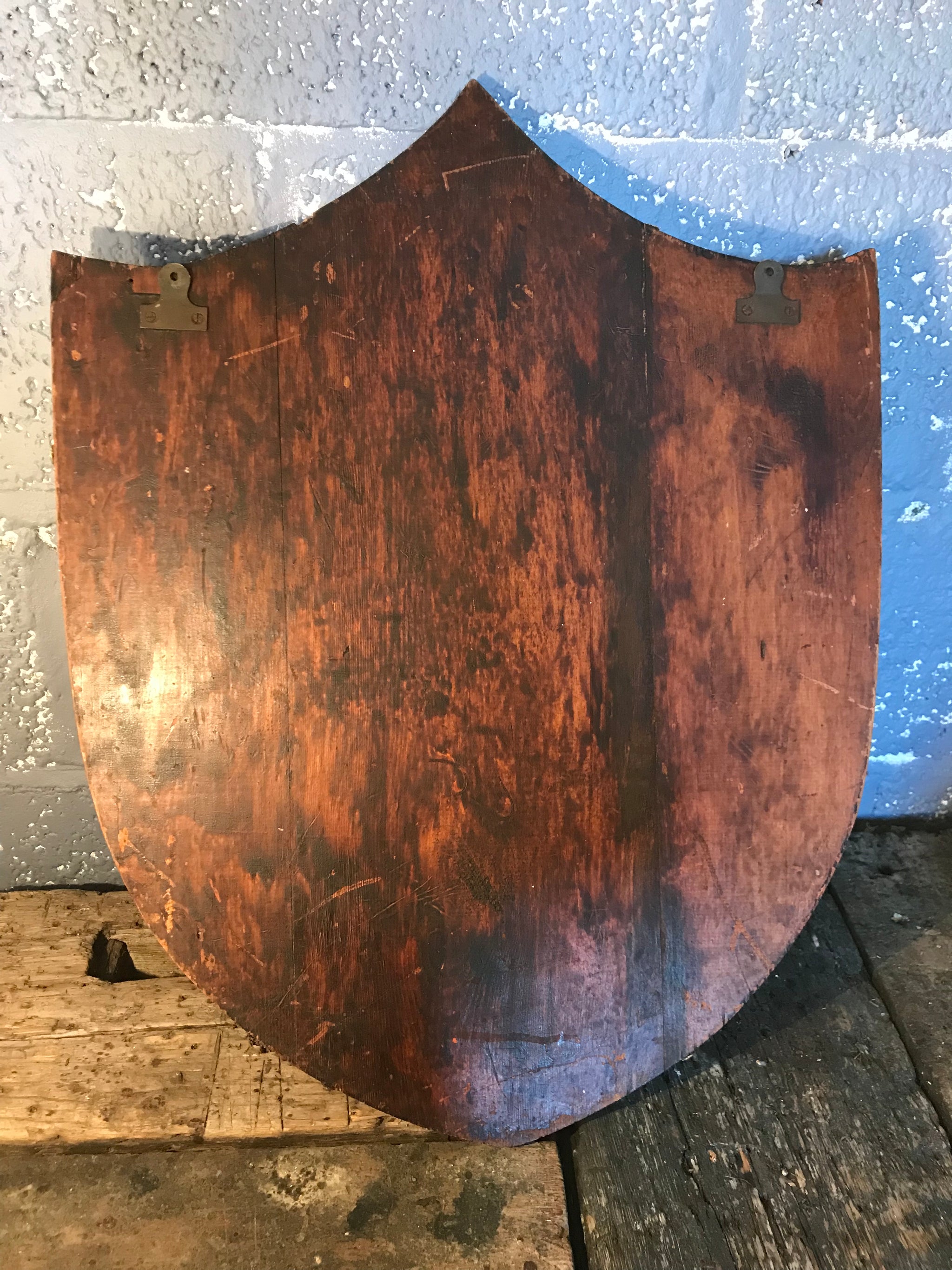 A large shield design bevelled Art Deco mirror