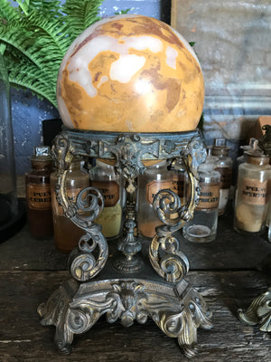 An 18th or 19th Century pair of Grand Tour marble balls on bronze ormolu stands