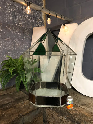 A very large leaded and stained glass terrarium
