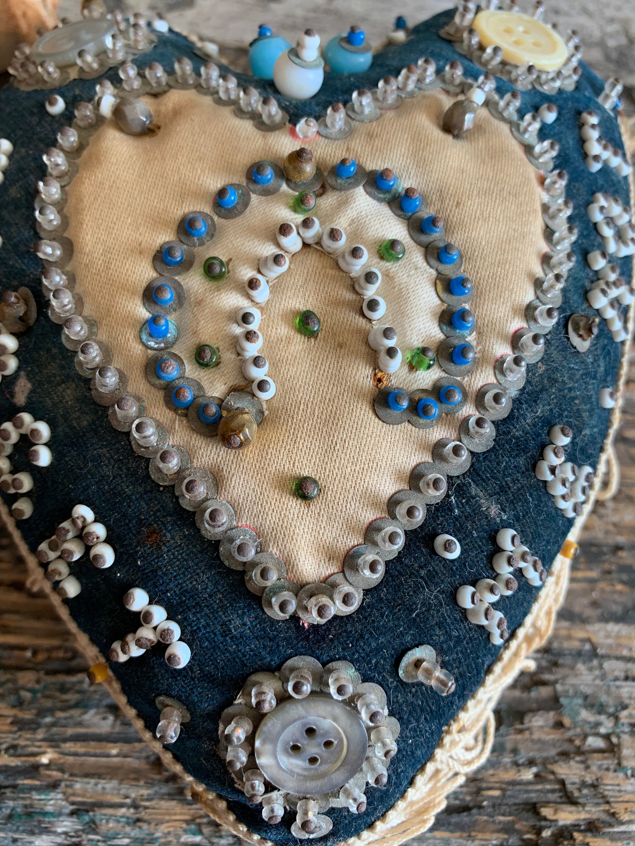 A First World War forget-me-not sweetheart pin cushion