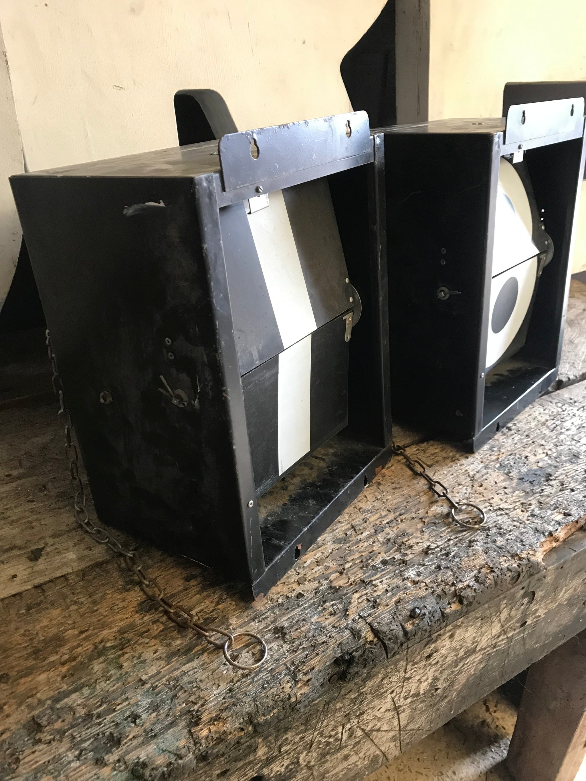 A pair of flip number cricket score boxes