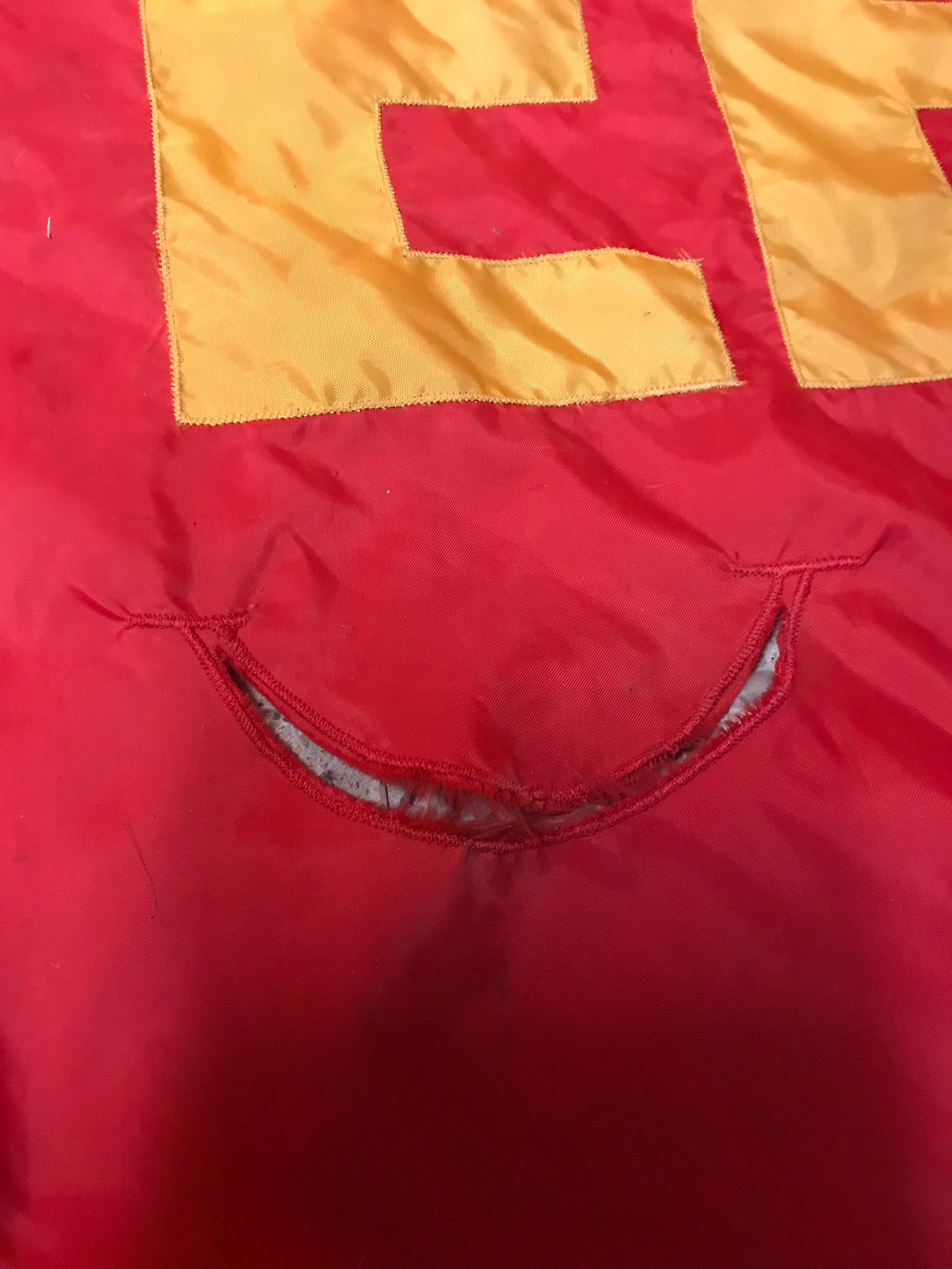 A large fairground or circus style Shanghai Acrobatic Theater of China banner