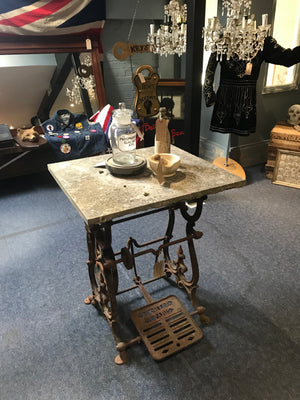 A French marble top cast iron garden sewing table
