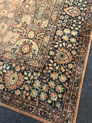 A rectangular blue ground Persian rug runner
