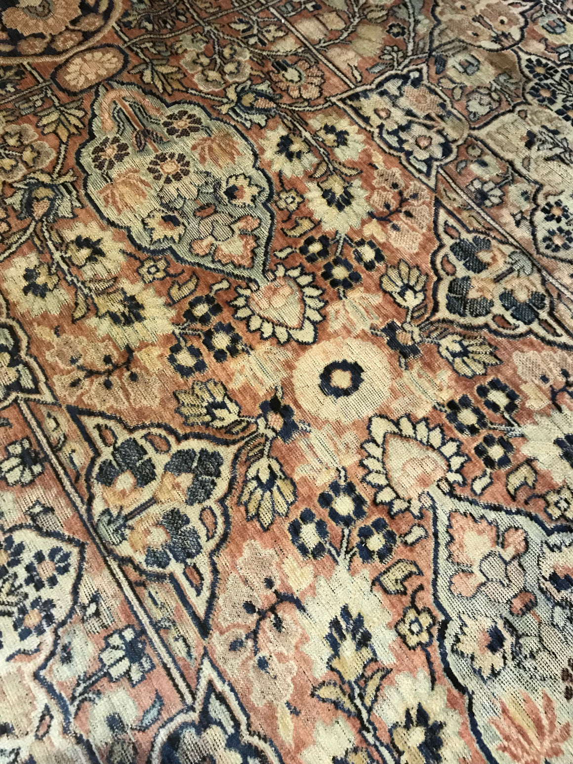 A rectangular blue ground Persian rug runner