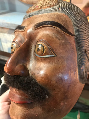 A 19th century Balinese carved wooden mask