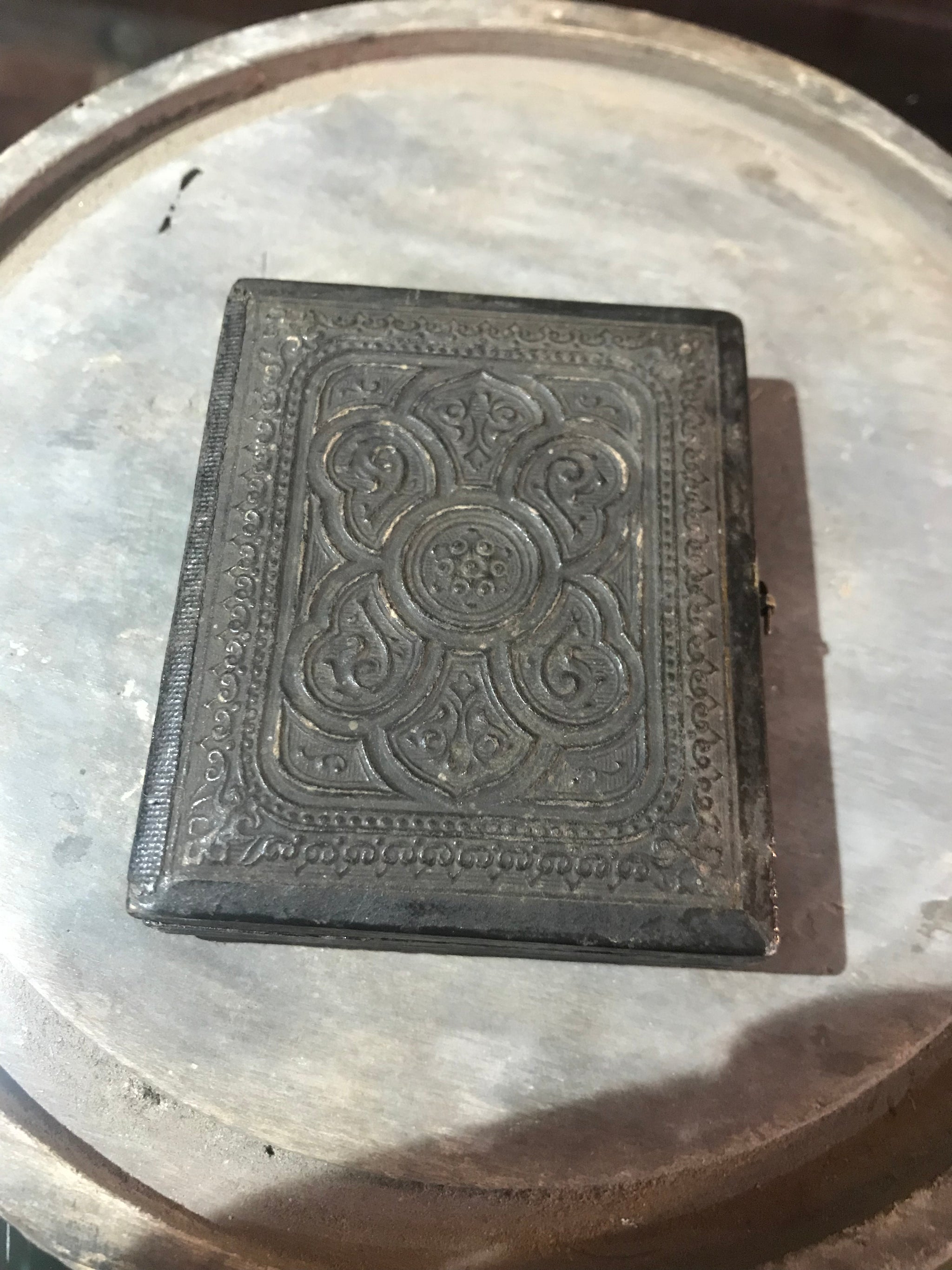 A 19th Century daguerreotype cased photograph of a lady with a lock of hair