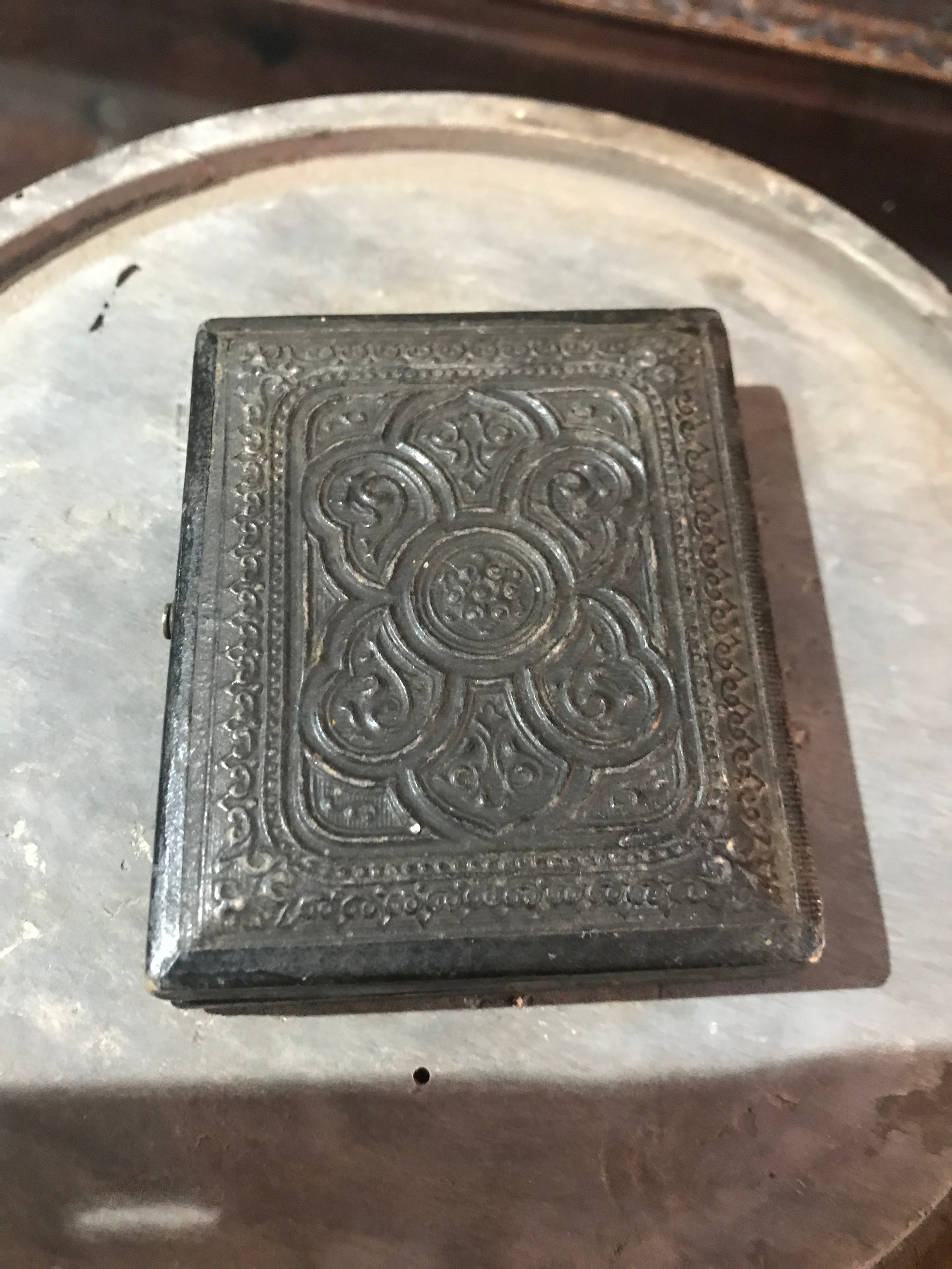 A 19th Century daguerreotype cased photograph of a lady with a lock of hair
