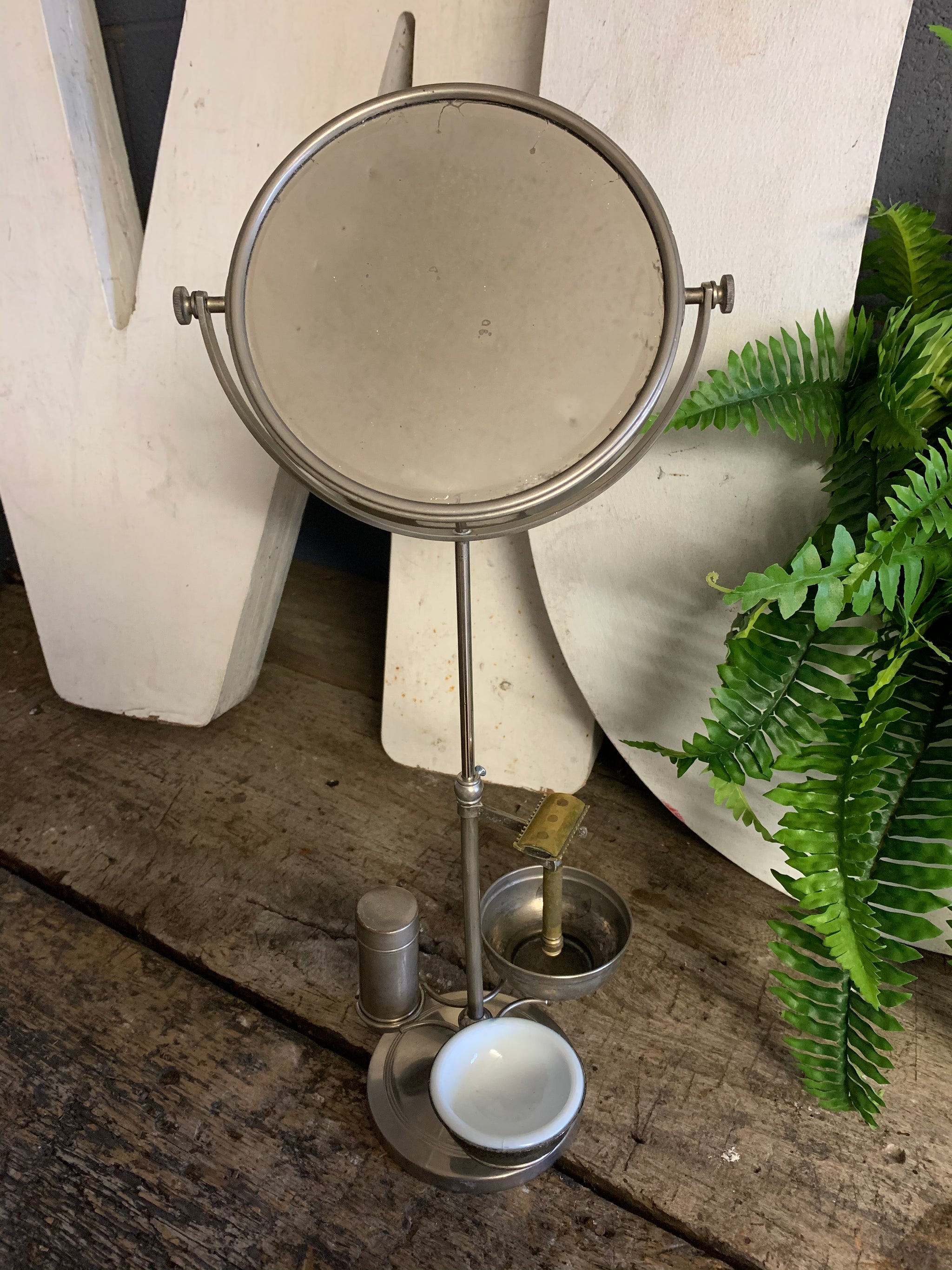 An Art Deco free standing adjustable shaving mirror