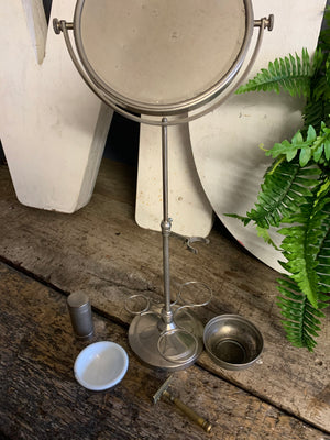 An Art Deco free standing adjustable shaving mirror