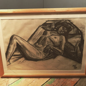 A mid-century female nude in charcoal