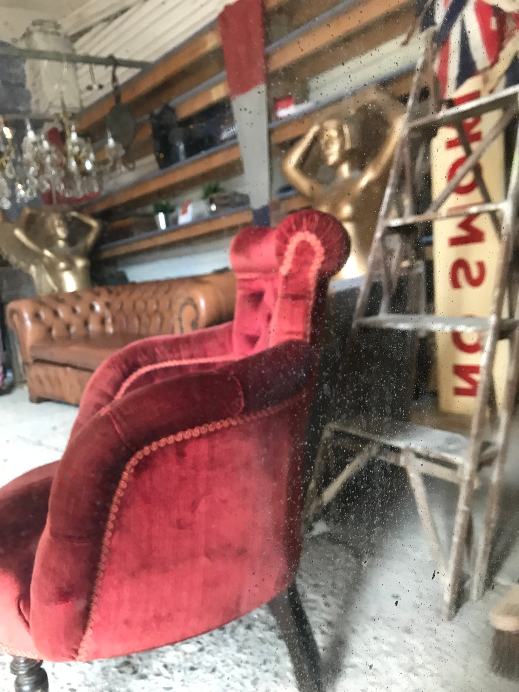 A large arched Louis Philippe overmantle mirror- foxed/distressed mercury glass plate