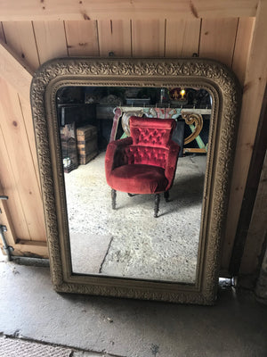 A large arched Louis Philippe overmantle mirror- foxed/distressed mercury glass plate