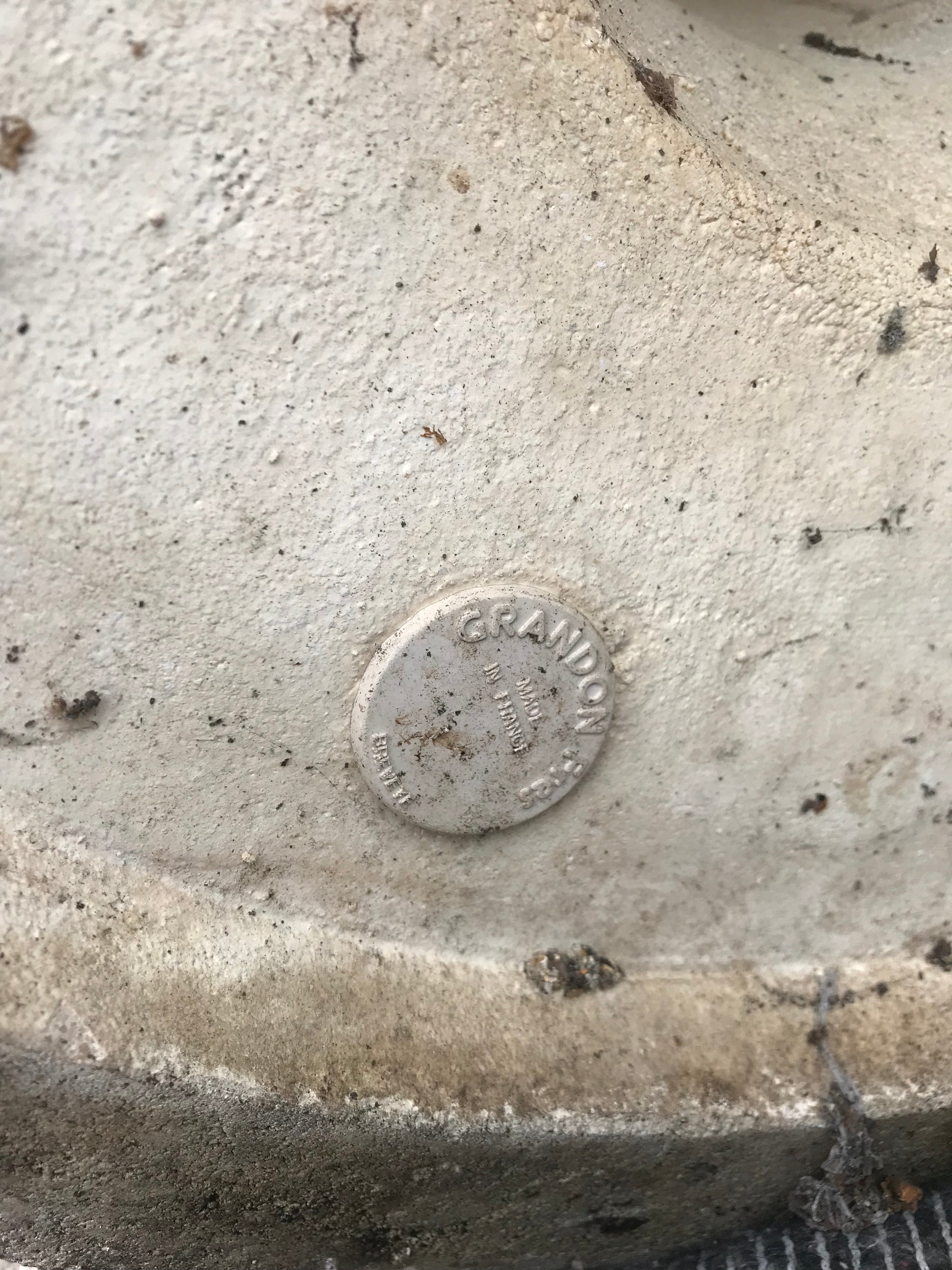 A French cast stone round top pedestal garden table by Grandon Fres