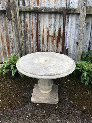 A French cast stone round top pedestal garden table by Grandon Fres