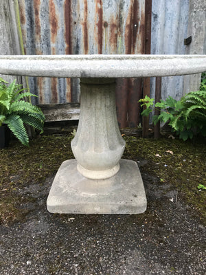 A French cast stone round top pedestal garden table by Grandon Fres