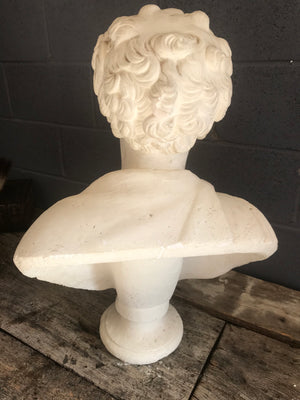 A large Neoclassical Roman bust in white plaster