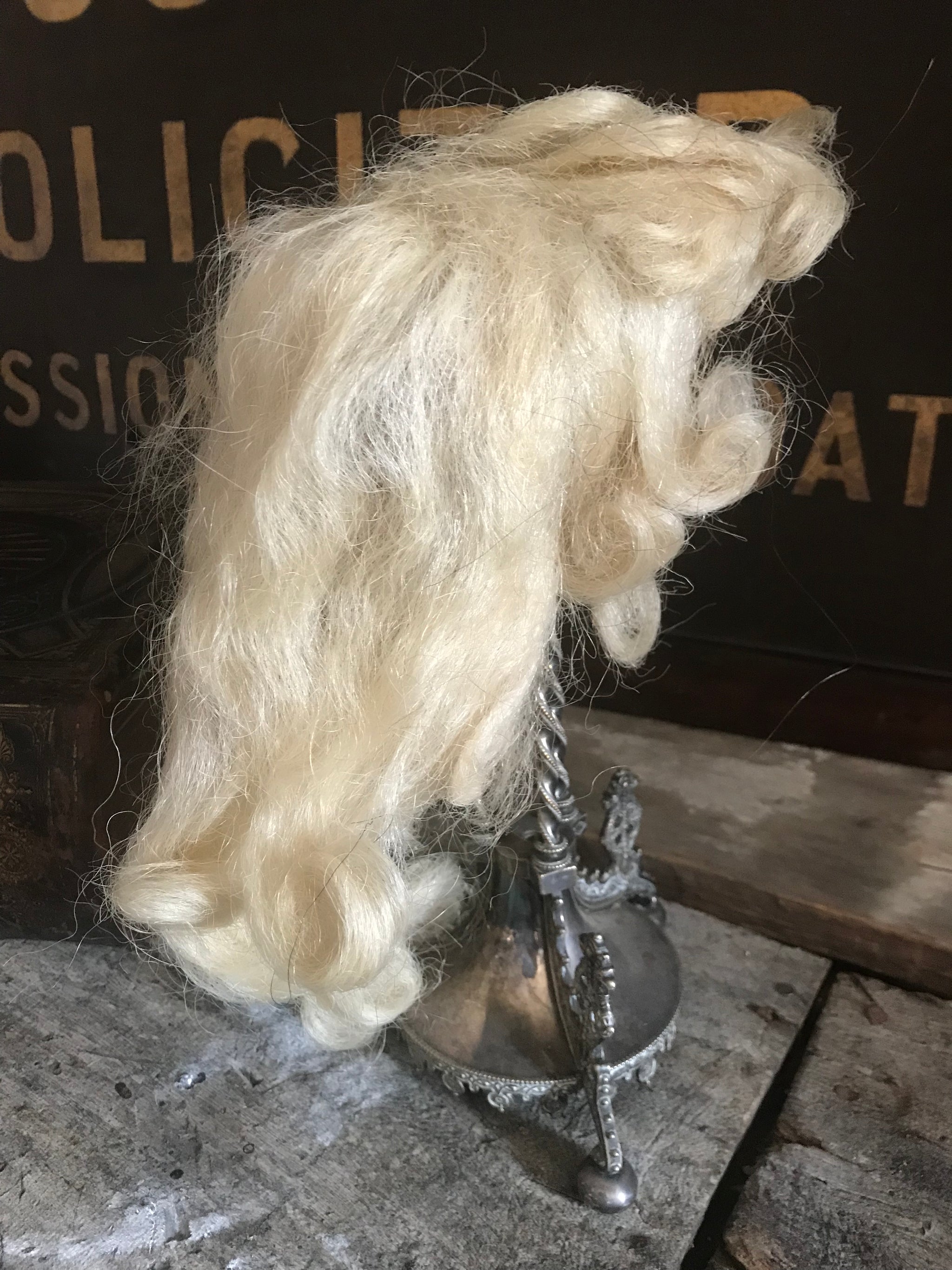 A vintage theatrical real hair white wig