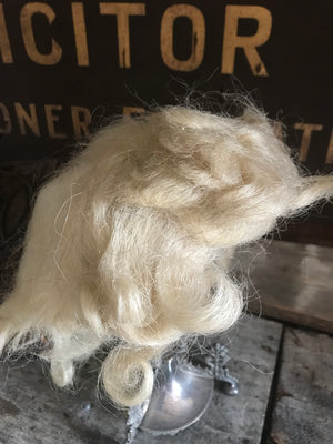 A vintage theatrical real hair white wig