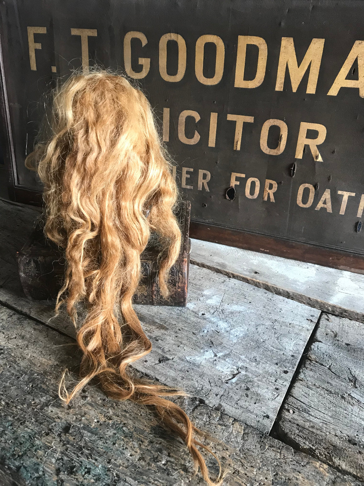 A vintage theatrical real hair wig of long red locks