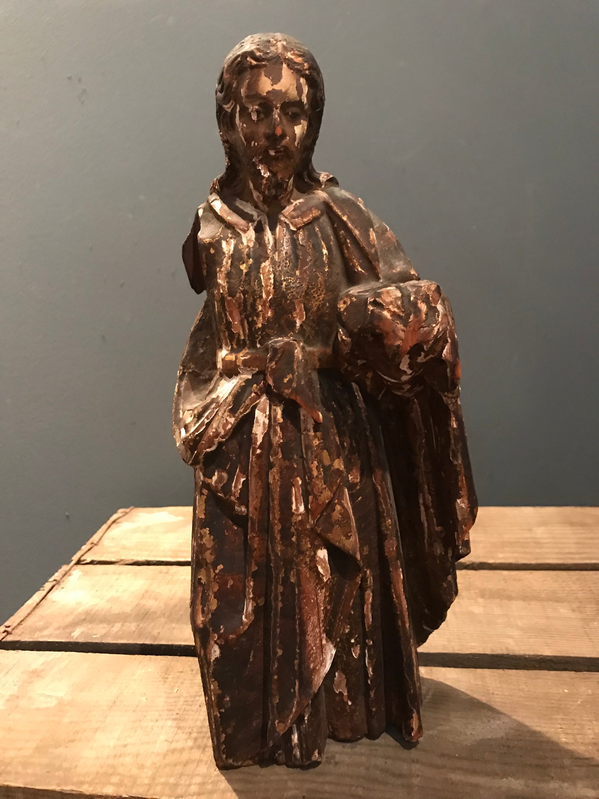 A large polychrome wooden Santos figure of Joseph