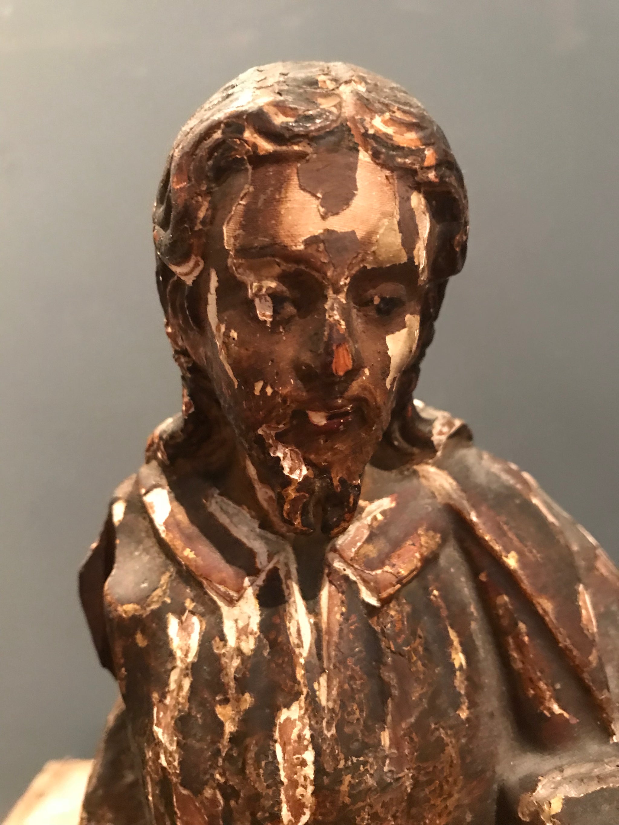 A large polychrome wooden Santos figure of Joseph