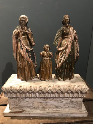 A large wooden polychrome Santos Holy Family group