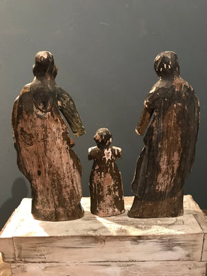 A large wooden polychrome Santos Holy Family group