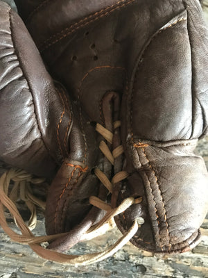 A vintage pair of brown leather Frank Bryan Boxing gloves