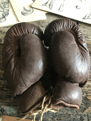 A vintage pair of brown leather Frank Bryan Boxing gloves