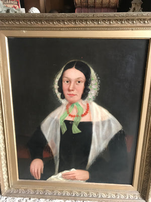 A large 19th century oil on canvas portrait of a lady