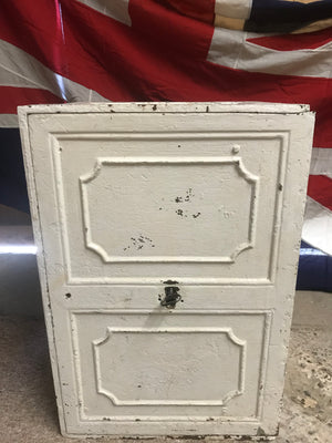 A white cast iron strong box safe with key