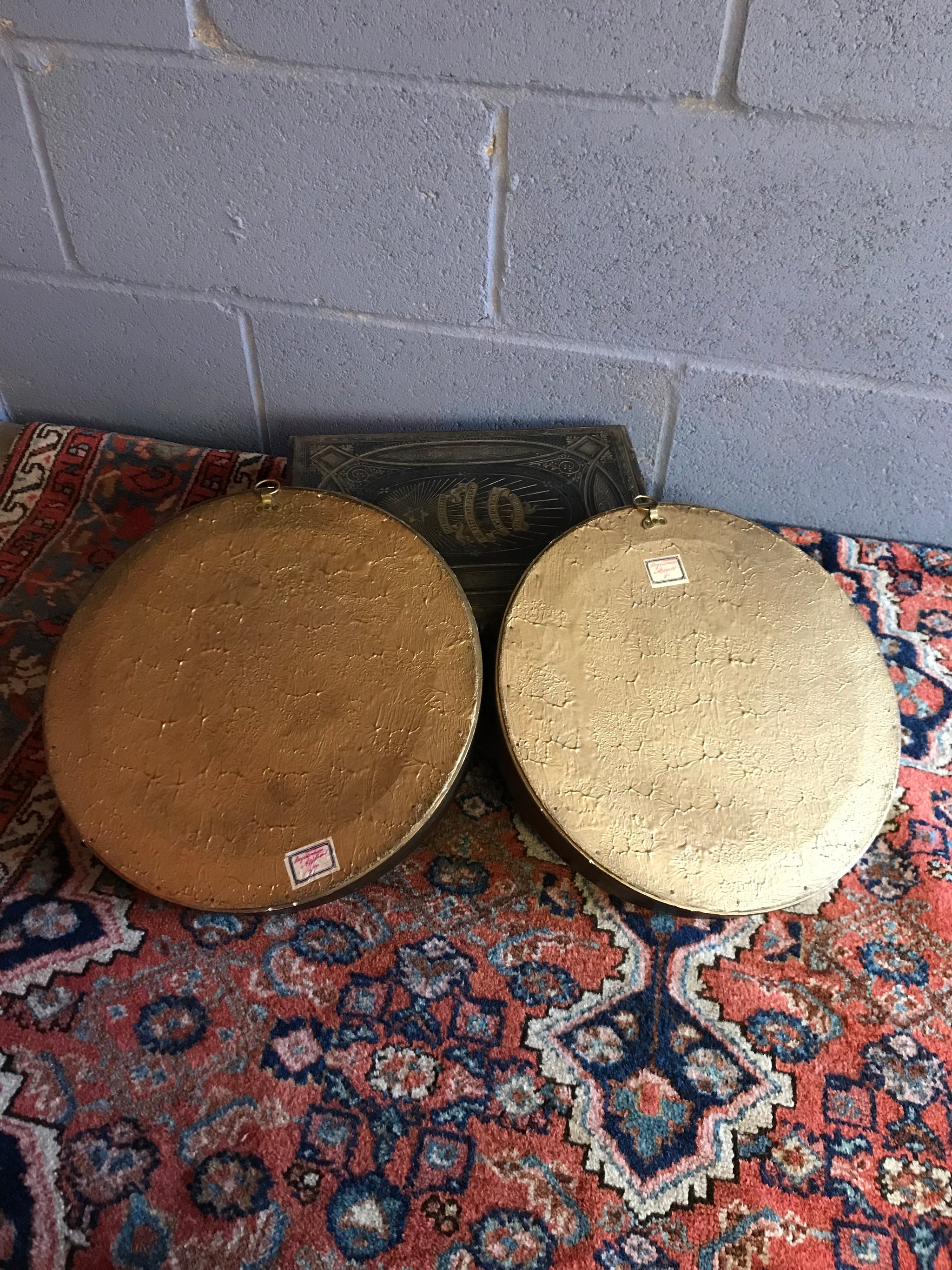 A rare pair of gilt convex ball mirrors