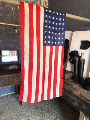A large 48 star USA Stars and Stripes flag